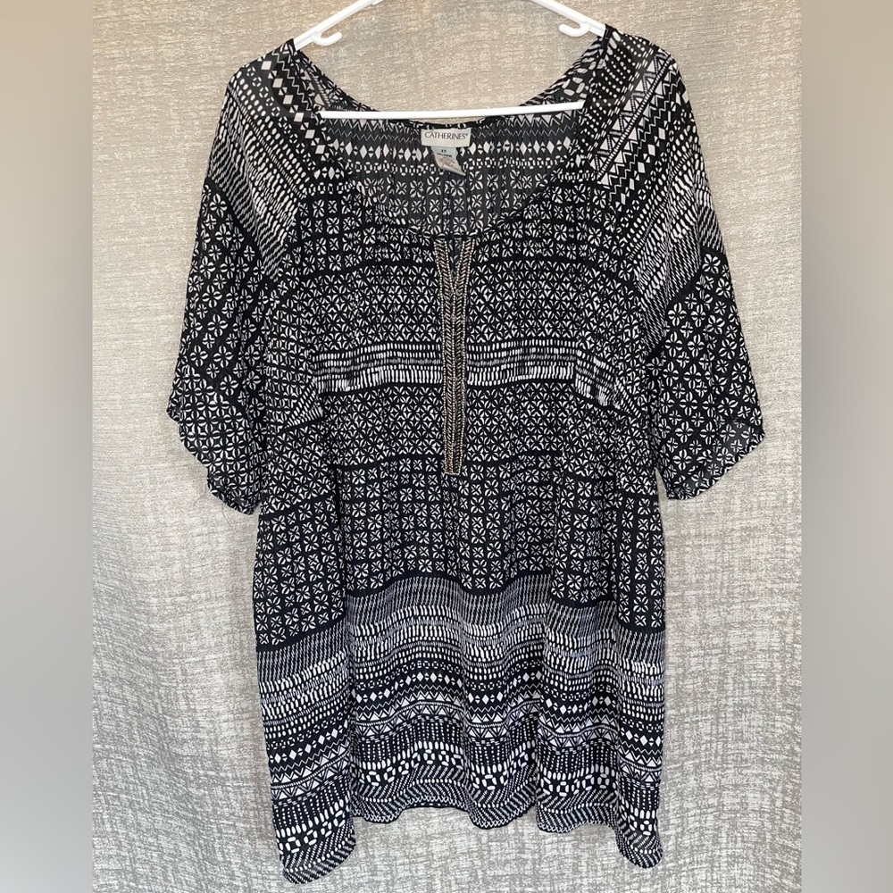 Catherine’s black and white blouse
